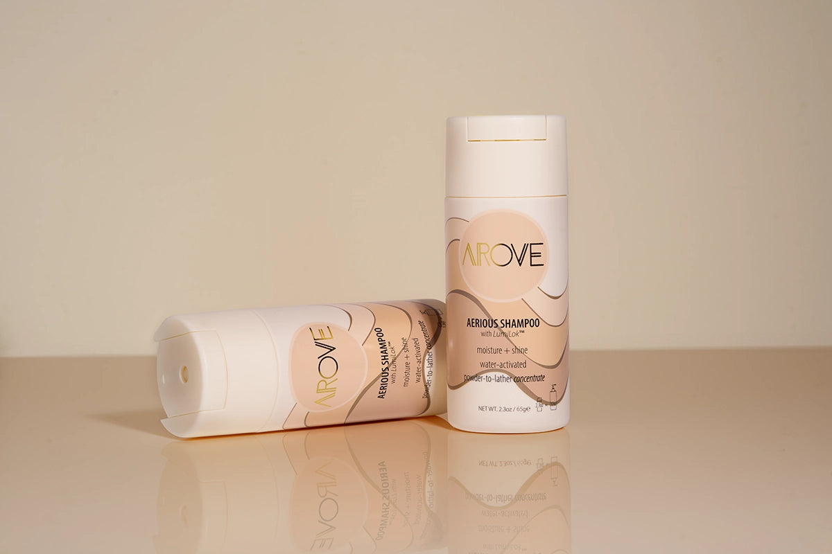 AROVE Aerious Shampoo – a water-free, powder-to-lather formula for deep hydration, scalp health, and sustainable haircare.