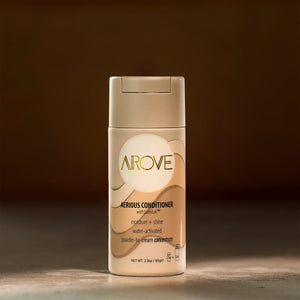 AROVE Aerious Conditioner – a powder-to-cream, water-activated formula that deeply hydrates, smooths, and nourishes hair with clean ingredients.