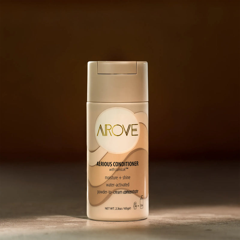 AROVE Aerious Conditioner – a powder-to-cream, water-activated formula that deeply hydrates, smooths, and nourishes hair with clean ingredients.